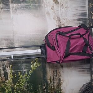 Forecast magenta rolling travel luggage bag with hidden retractable handle